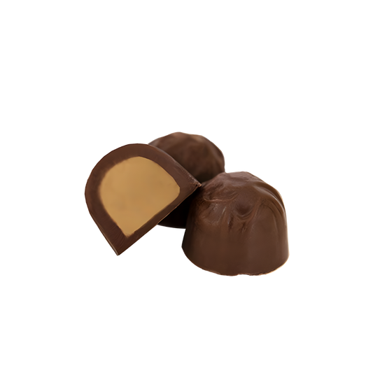 Haven Herb milk chocolate domes with creamy peanut butter filling close up on black background